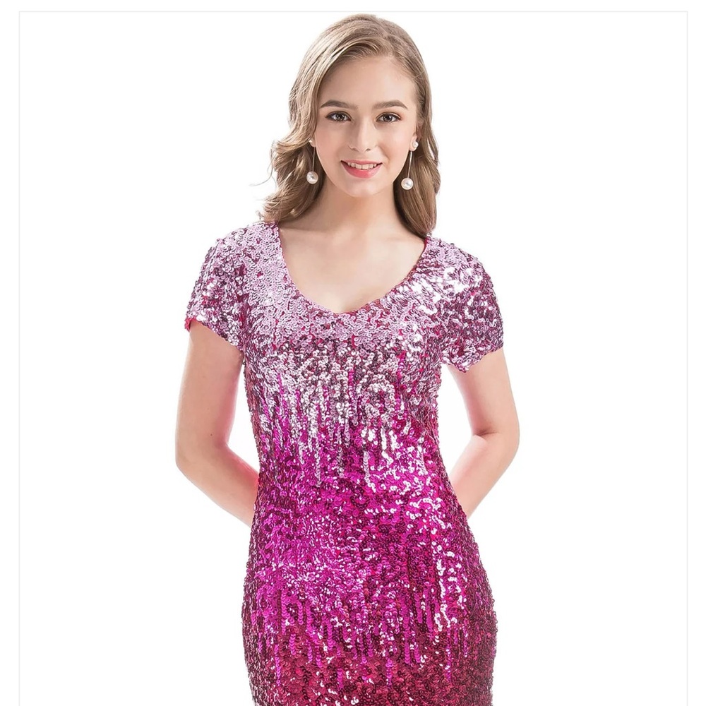 Cute pink sequin dress. Would be perfect for prom or semi - formal .